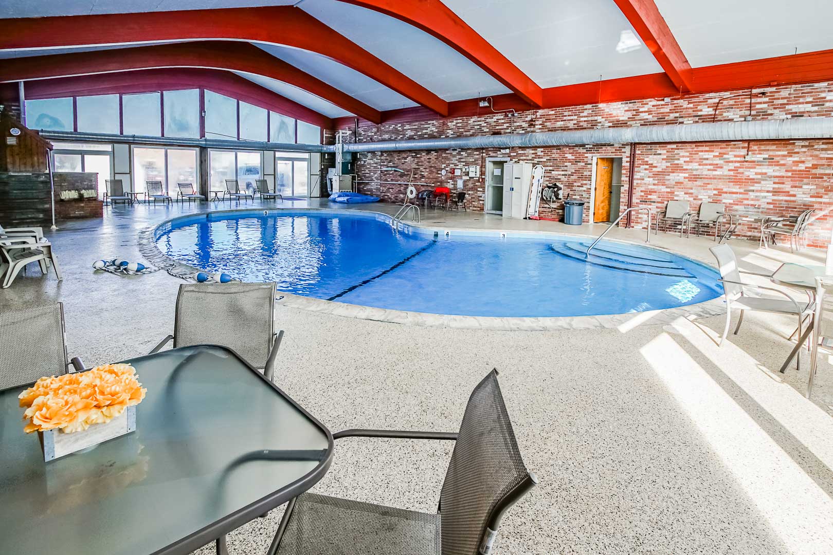 A tranquil indoor swimming pool at VRI's Courtyard Resort in Massachusetts.